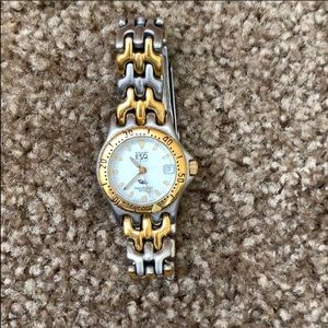Esque yellow gold and silver women’s watch